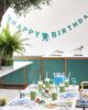 happy-birthday-garland-dino-talking-tables